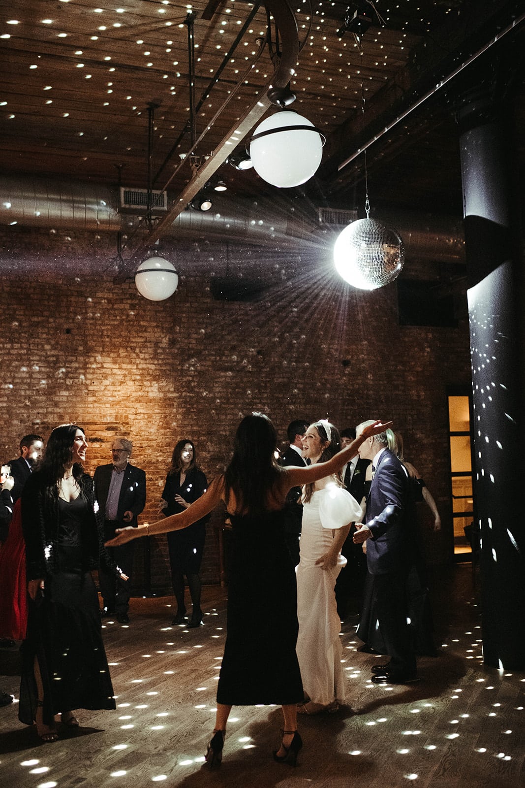 brooklyn new york wedding reception disco ball guest dancing