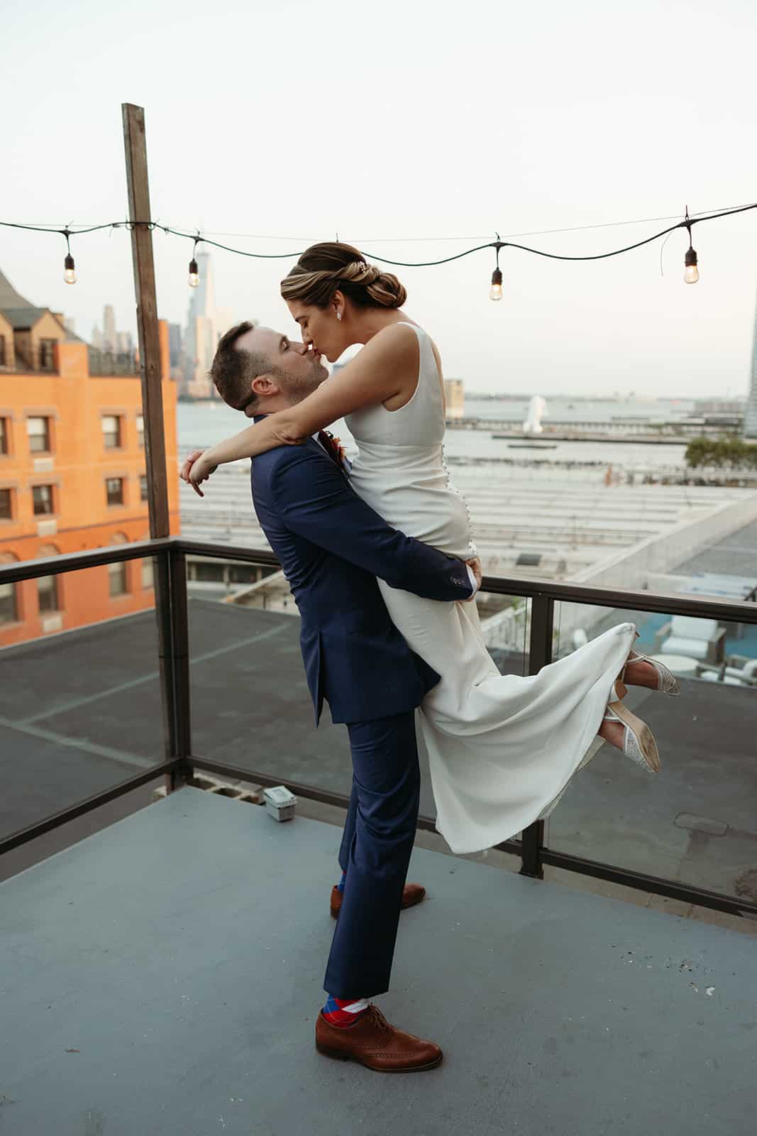 Hoboken wedding antique loft couple kissing portrait